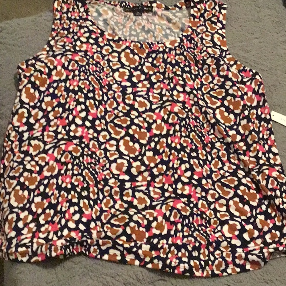 Dress shirt. Never worn. Multi color brown, white, pink and navy